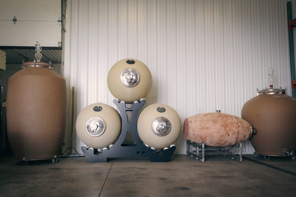 Amphora vessels in the wine cellar at Six Eighty Cellars, a sustainable winery in upstate new york in the Finger Lakes